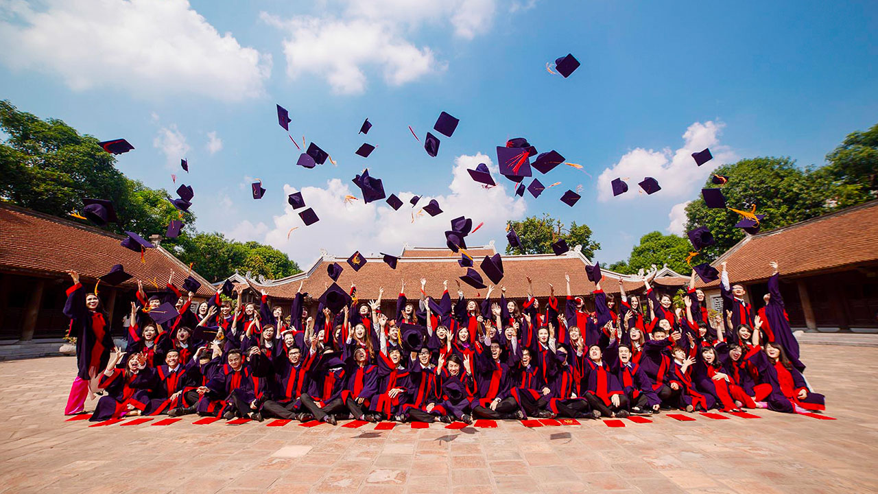 Students take graduation photos at the Temple of Literature