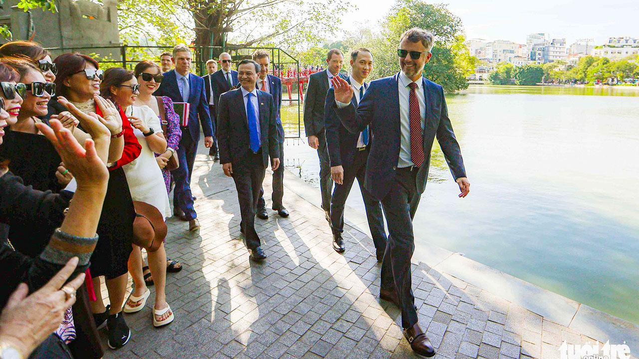 Crown Prince Frederik of Denmark walks around Hoan Kiem Lake