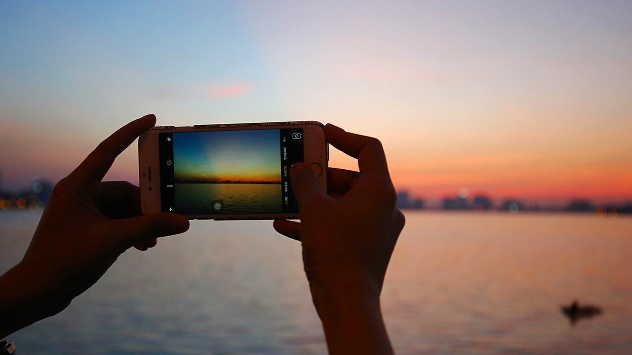 Take photos at West Lake Hanoi