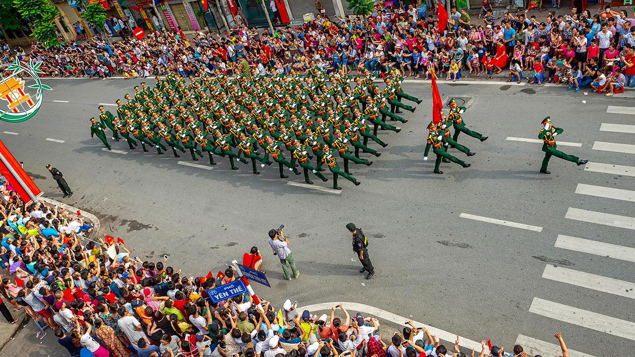 The military blocs march with crisp, intimidating precision